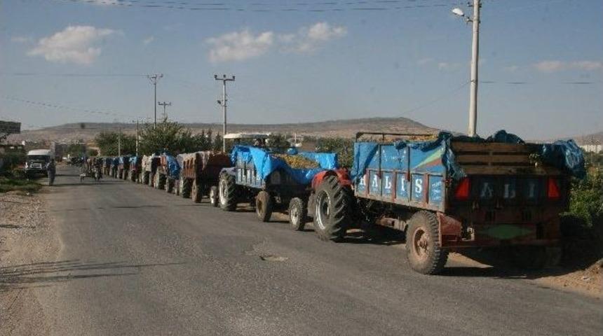 &Uuml;z&uuml;m &Uuml;reticilerinin Kuyruk &Ccedil;ilesi S&uuml;r&uuml;yor