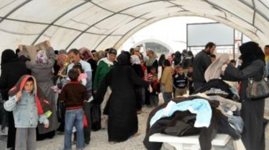 30 Bin M&uuml;lteciye Giyim Malzemesi Dağıtılıyor