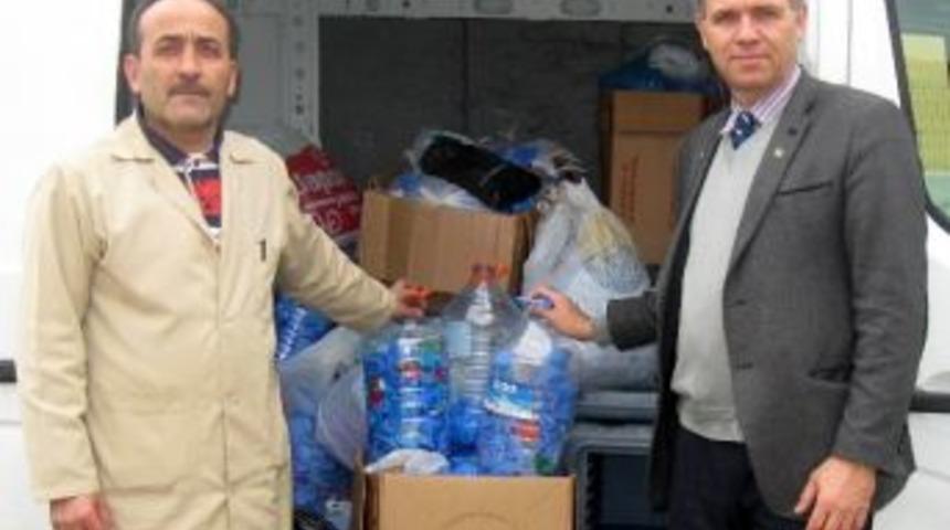 &Ouml;rnek Muhtar Mavi Kapakları Teslim Etti