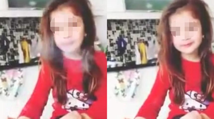 Sosyal medyada skandal g&ouml;r&uuml;nt&uuml;! Kızına makyaj yapıp sigara i&ccedil;irdi