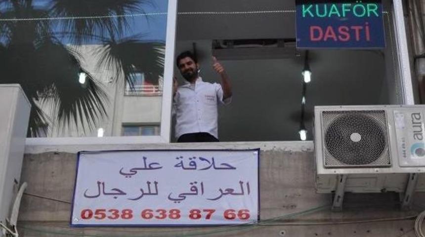 Denizli'de Arap&ccedil;a Tabelalı Berbere Iraklı &Ccedil;alışan