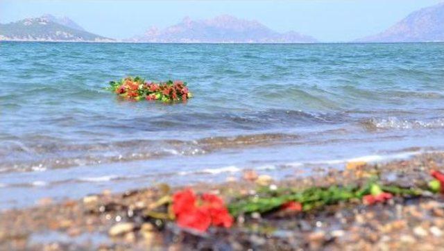 In Pictures: Cloves, Wreaths Left Where Aylan Kurdi Washed Ashore