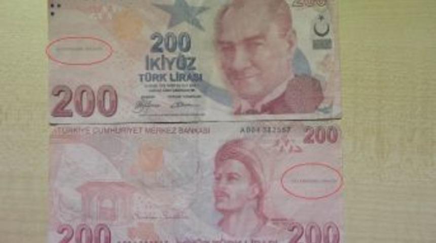 &Uuml;zerinde &rsquo;ge&ccedil;ersizdir&rsquo; Yazan Para İle Cep Telefonu Satın Aldı