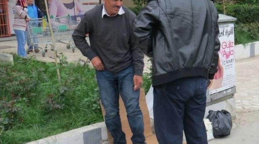 Katil Zanlısı Dilenirken Yakalandı