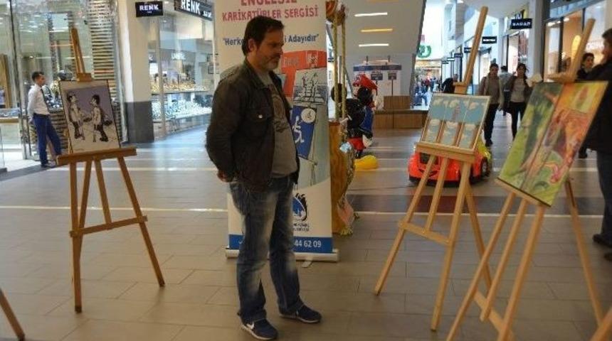 Karikat&uuml;ristler Engelleri Kaldırmak İ&ccedil;in &Ccedil;izdi