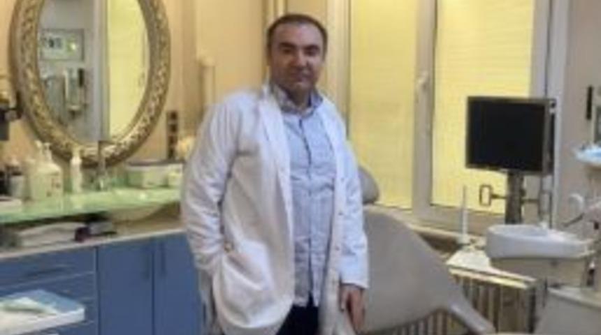 Diş Hekimi Dr. D&uuml;ndar &Ouml;zbaylar: