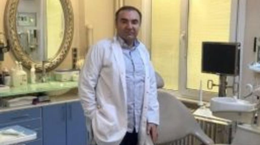 Diş Hekimi Dr. D&uuml;ndar &Ouml;zbaylar: