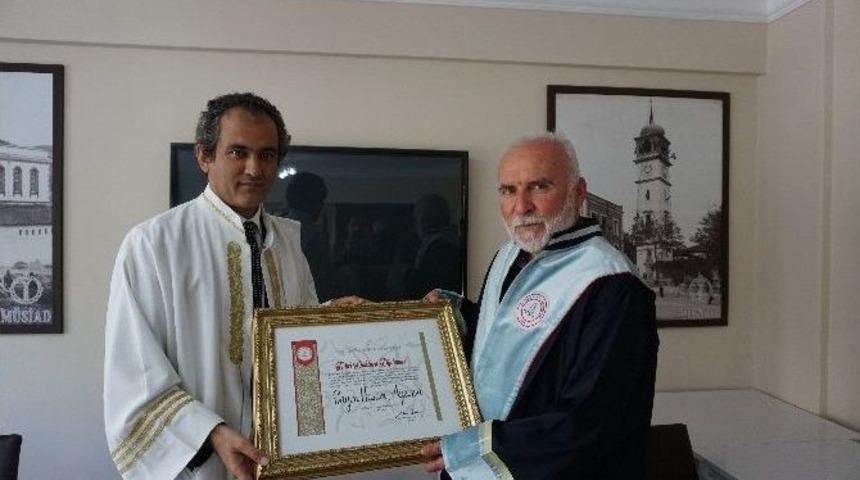 Be&uuml;&rsquo;den Hasan Aycın&rsquo;a Fahri Doktora