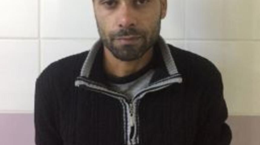 İnsan Ka&ccedil;ak&ccedil;ısı Polisi &Ouml;ld&uuml;r&uuml;yordu