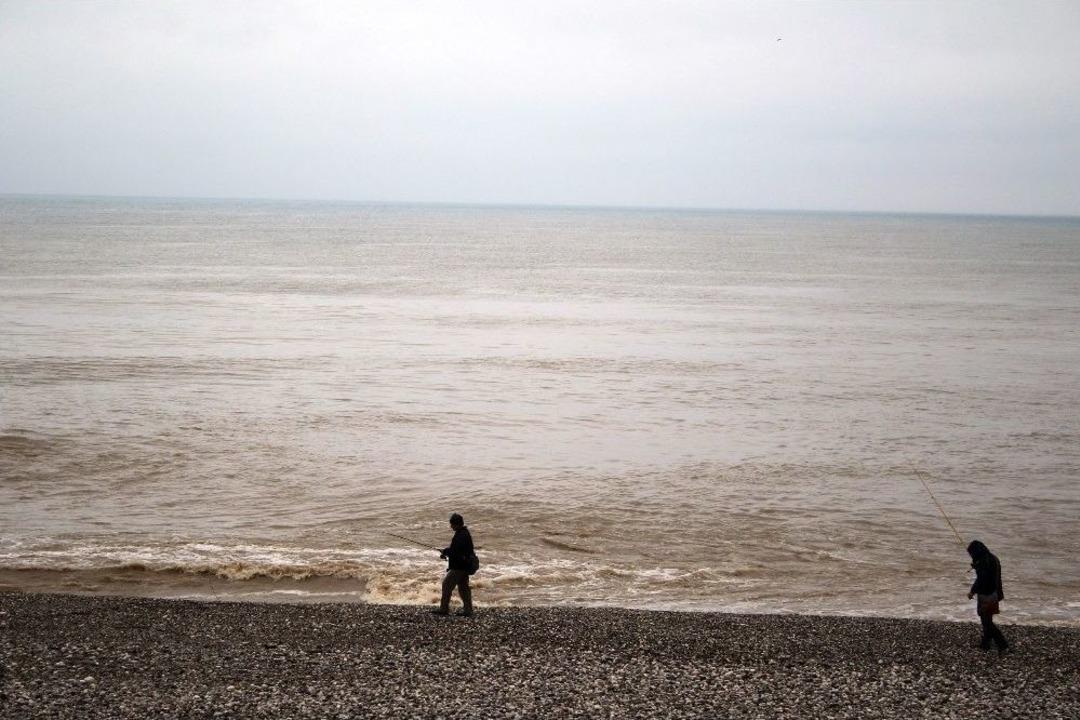 D&uuml;nyaca &Uuml;nl&uuml; Konyaaltı Sahili Kahverengiye B&uuml;r&uuml;nd&uuml;