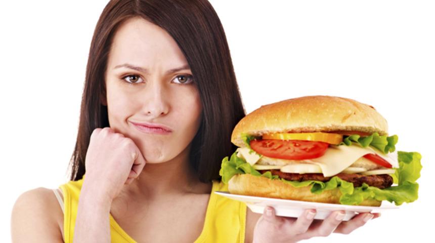 Mutsuzken Neden Daha &Ccedil;ok Yiyoruz?