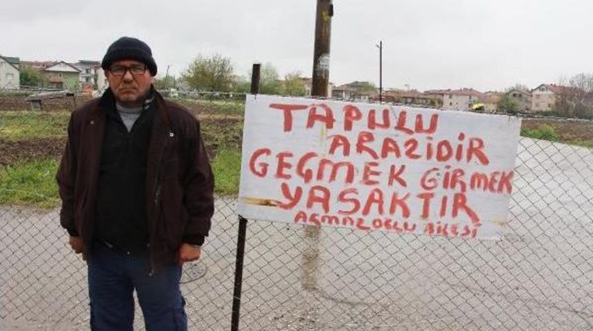 Arazisinden Geçen Yolu Telle Çevirip Kapattı