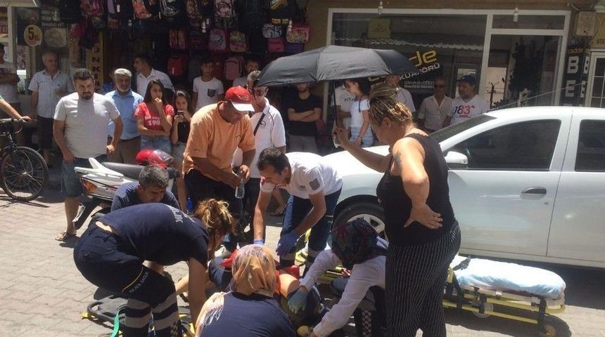 Yaralıyı G&uuml;neşten Korumak İ&ccedil;in Şemsiyeyle Başında Bekledi