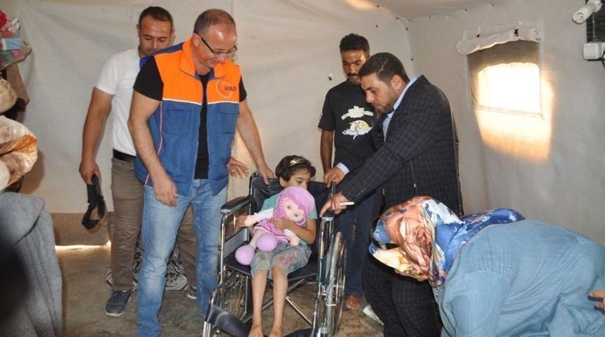 Engelli M&uuml;ltecilere Tekerlekli Sandalye Dağıtıldı