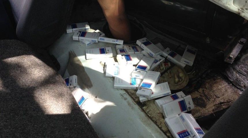 Otomobilin Yakıt Deposundan Ka&ccedil;ak Sigara &Ccedil;ıktı