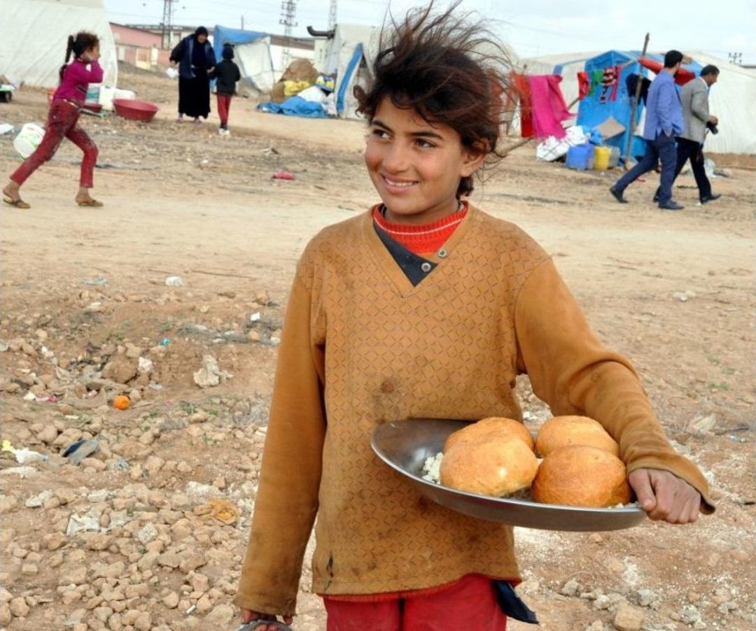 &Ccedil;adırlarda Yaşayan Suriyeli Sığınmacılara Sıcak Yemek Dağıtıldı