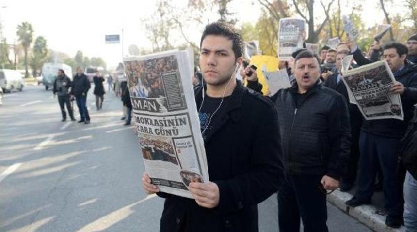 14 Aralık Operasyonlarını Kur'an Ve Zaman Gazetesi  Okuyarak Protesto Ettiler