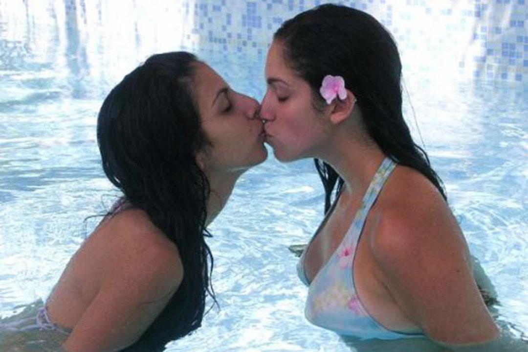 Lesbians Kissing In A Pool