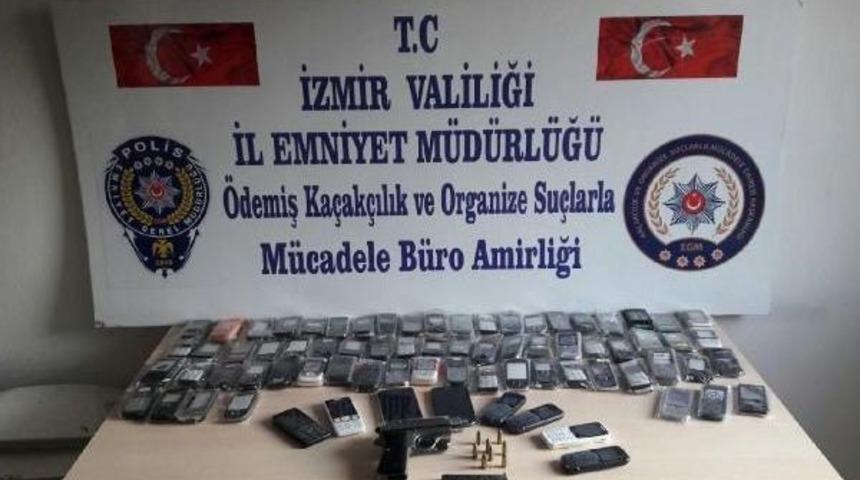 &Ouml;demiş'te Ka&ccedil;ak Cep Telefonu Operasyonu