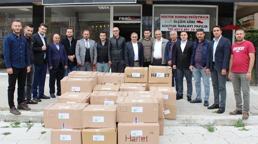 İhtiya&ccedil; sahibi &ouml;ğrencilere ayakkabı hediye edildi