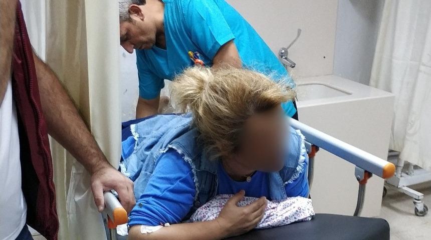 Silahlı kavgada kazara vurulan kadın hastanelik oldu