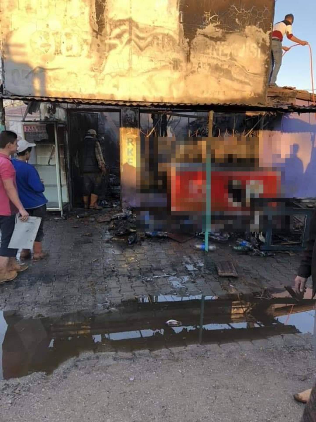 Girdiği marketi &ouml;nce soydu sonra ateşe verdi