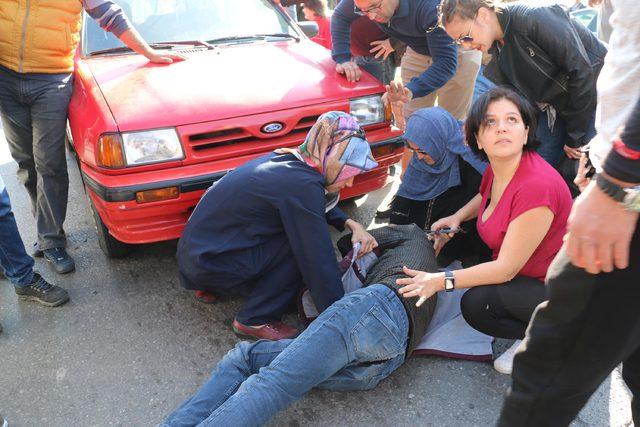 Yol verme kavgasında yere düştü, arkadaki otomobilin altında kalarak yaralandı